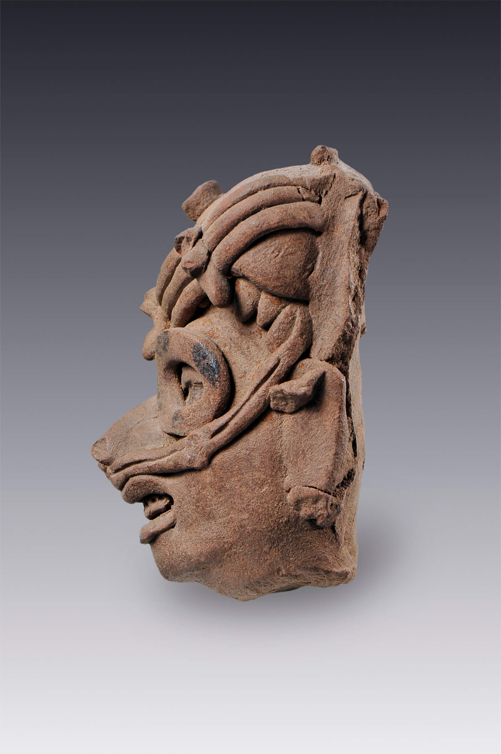 Rostro humano con anillos en los ojos | El México antiguo. Salas de Arte Prehispánico | Museo Amparo, Puebla