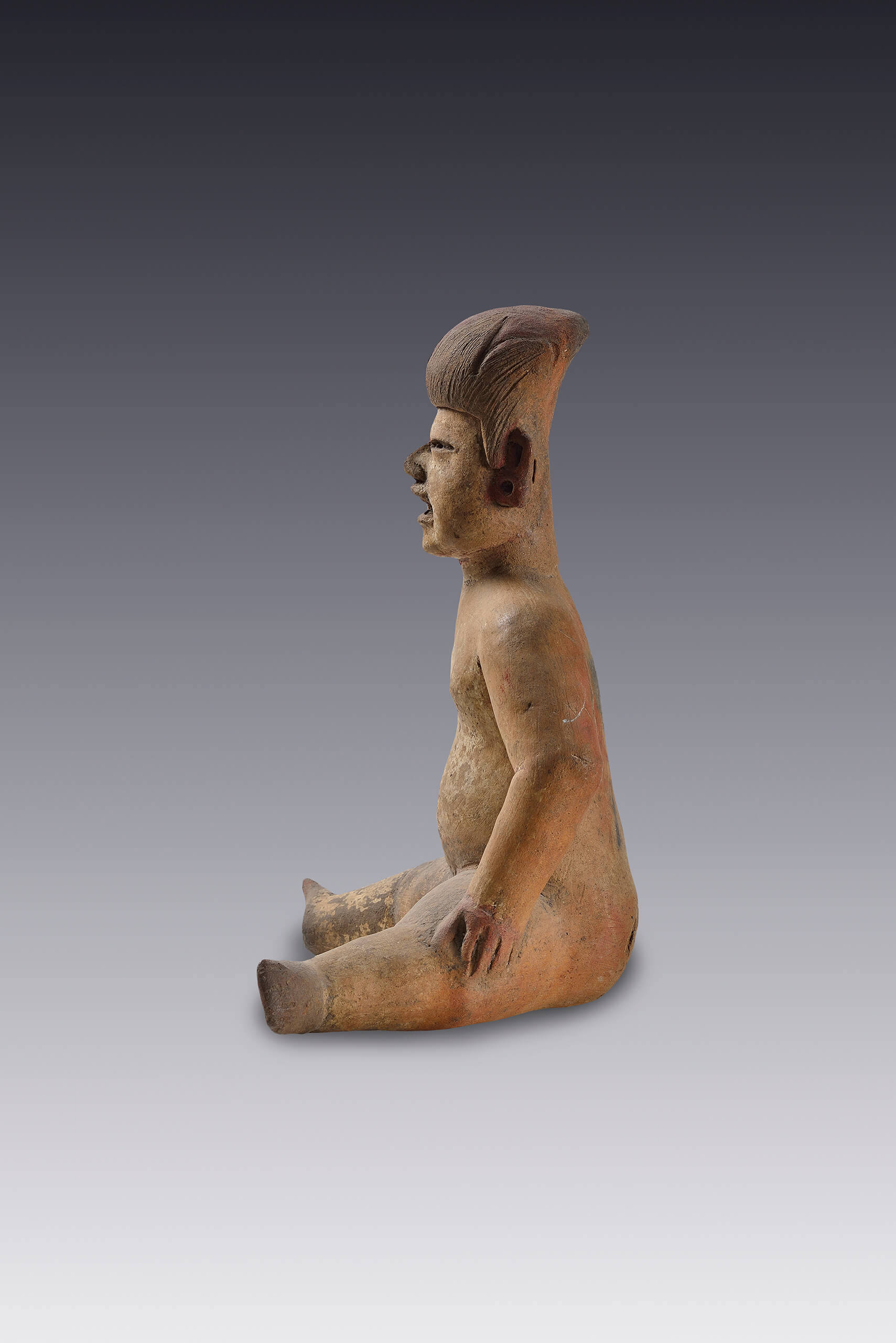 Figura humana sentada | El México antiguo. Salas de Arte Prehispánico | Museo Amparo, Puebla