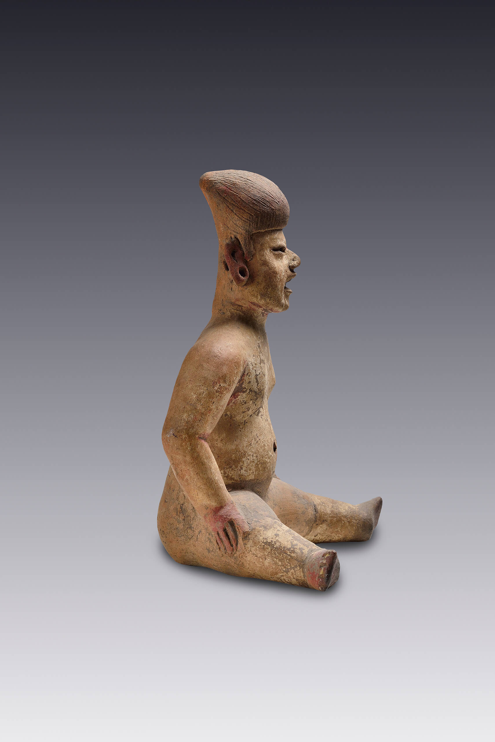 Figura humana sentada | El México antiguo. Salas de Arte Prehispánico | Museo Amparo, Puebla