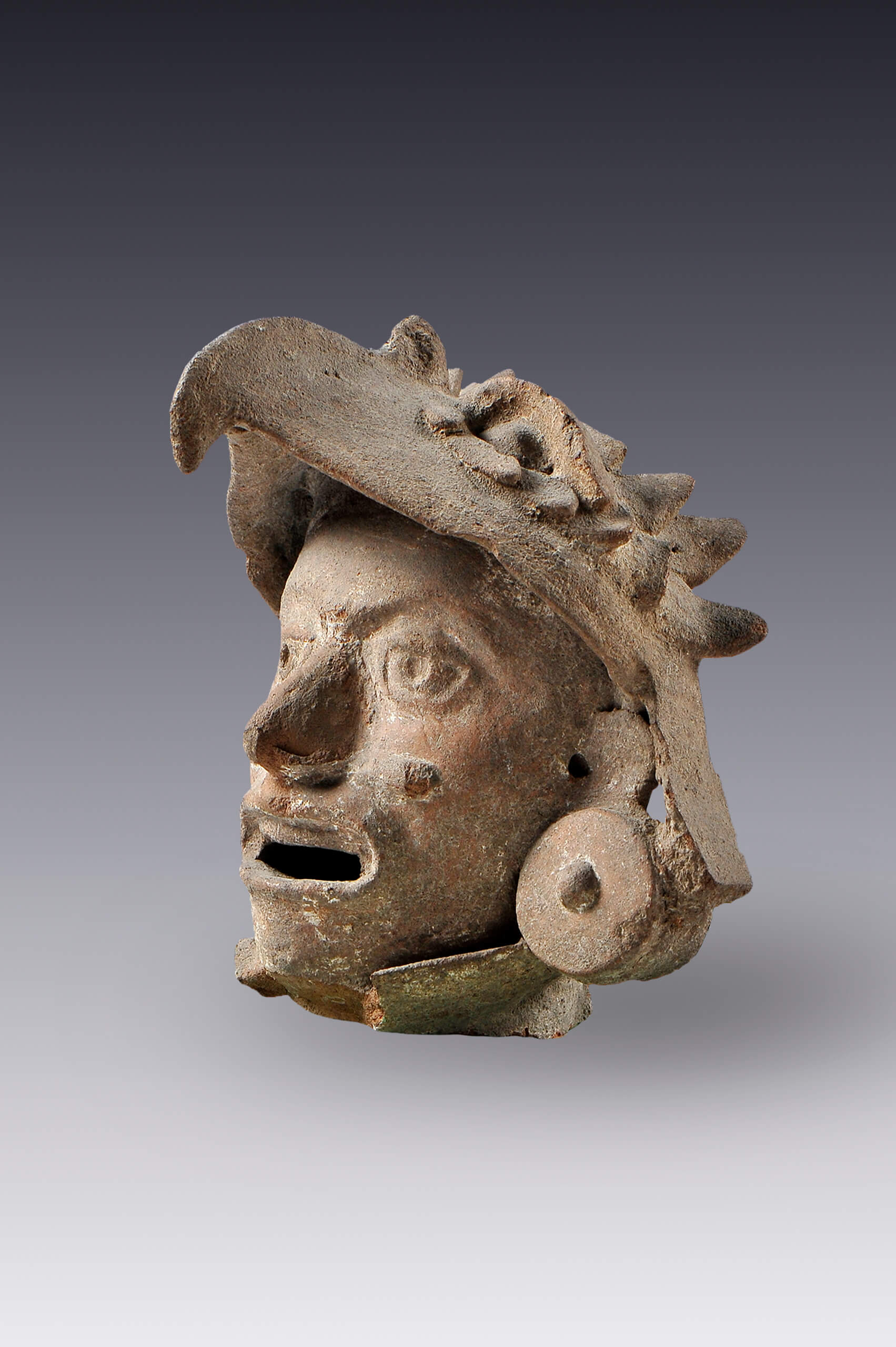 Rostro humano con casco de águila (fragmento) | El México antiguo. Salas de Arte Prehispánico | Museo Amparo, Puebla