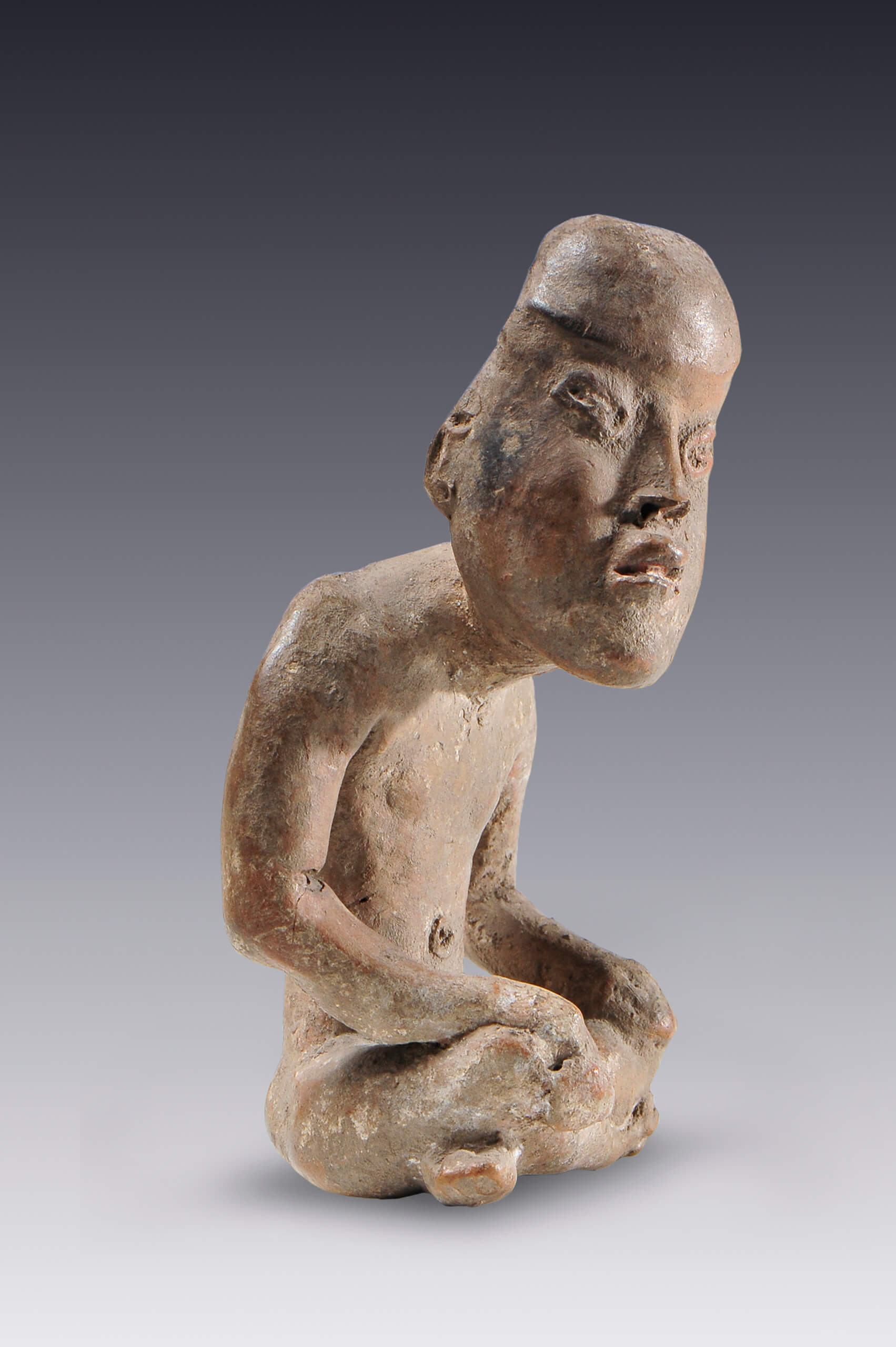 Hombre sentado | El México antiguo. Salas de Arte Prehispánico | Museo Amparo, Puebla