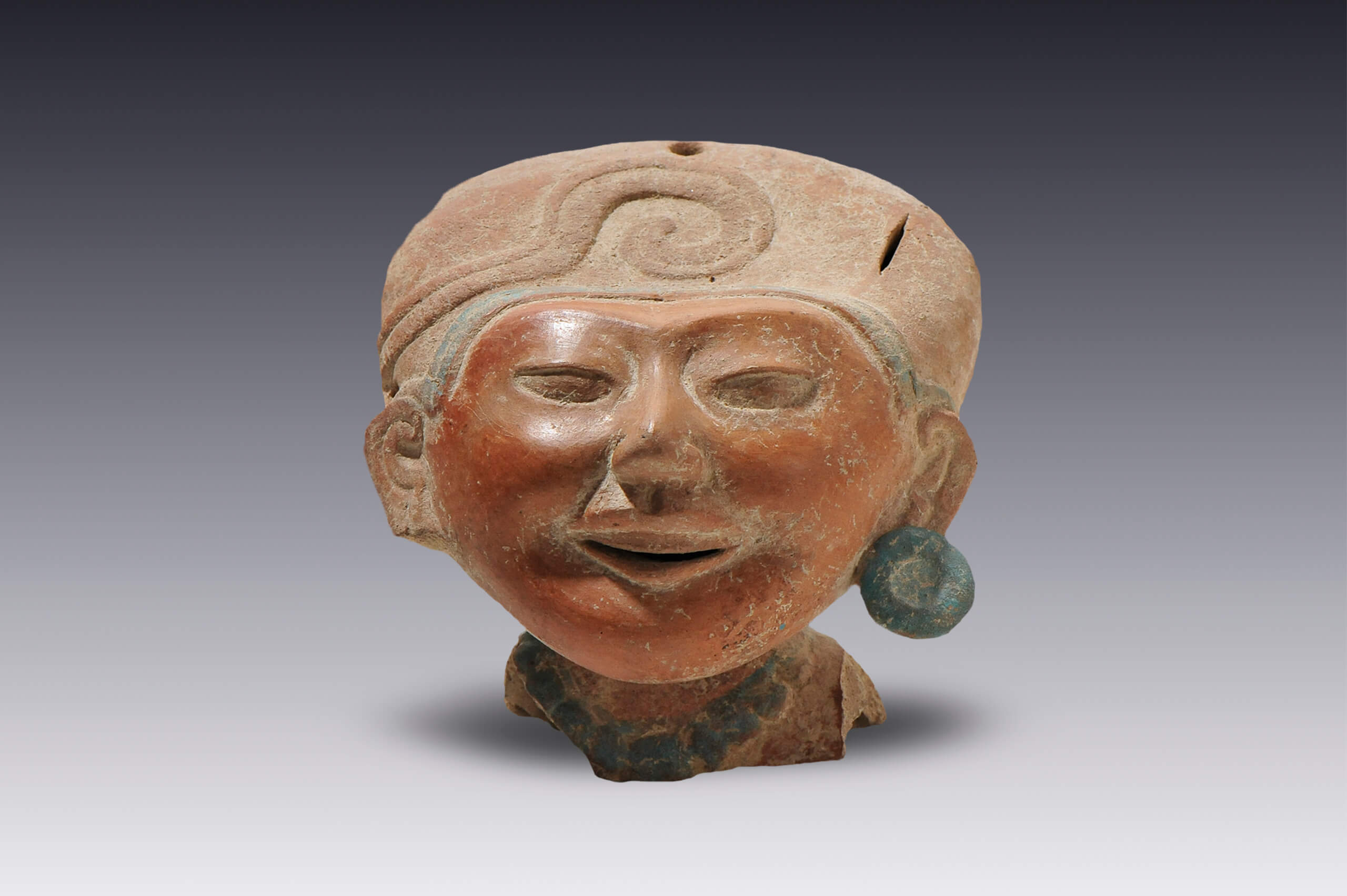 Carita sonriente (fragmento) | El México antiguo. Salas de Arte Prehispánico | Museo Amparo, Puebla