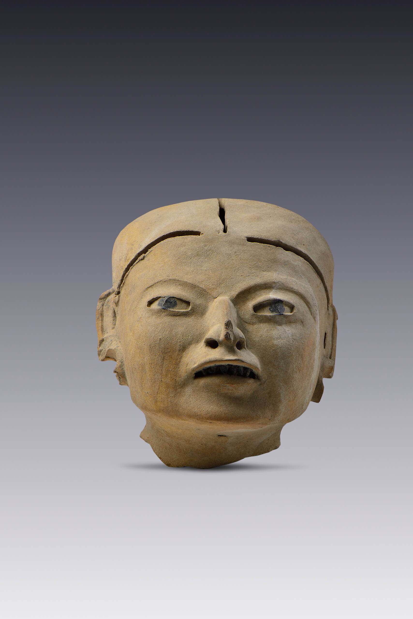 Cabeza de figurilla antropomorfa de terracota | El México antiguo. Salas de Arte Prehispánico | Museo Amparo, Puebla