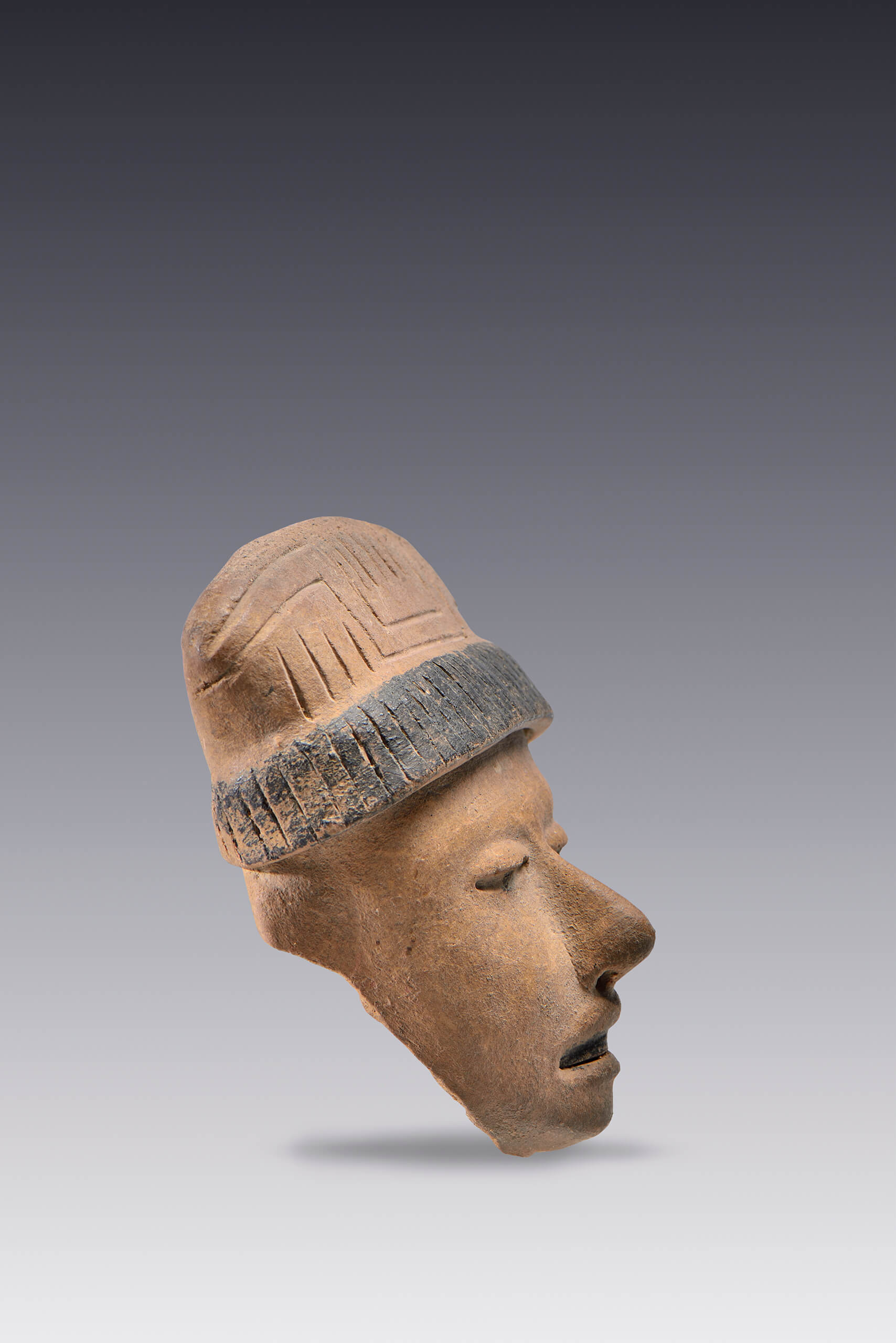 Rostros con decoración facial con chapopote | El tiempo en las cosas II. Salas de Arte Contemporáneo | Museo Amparo, Puebla