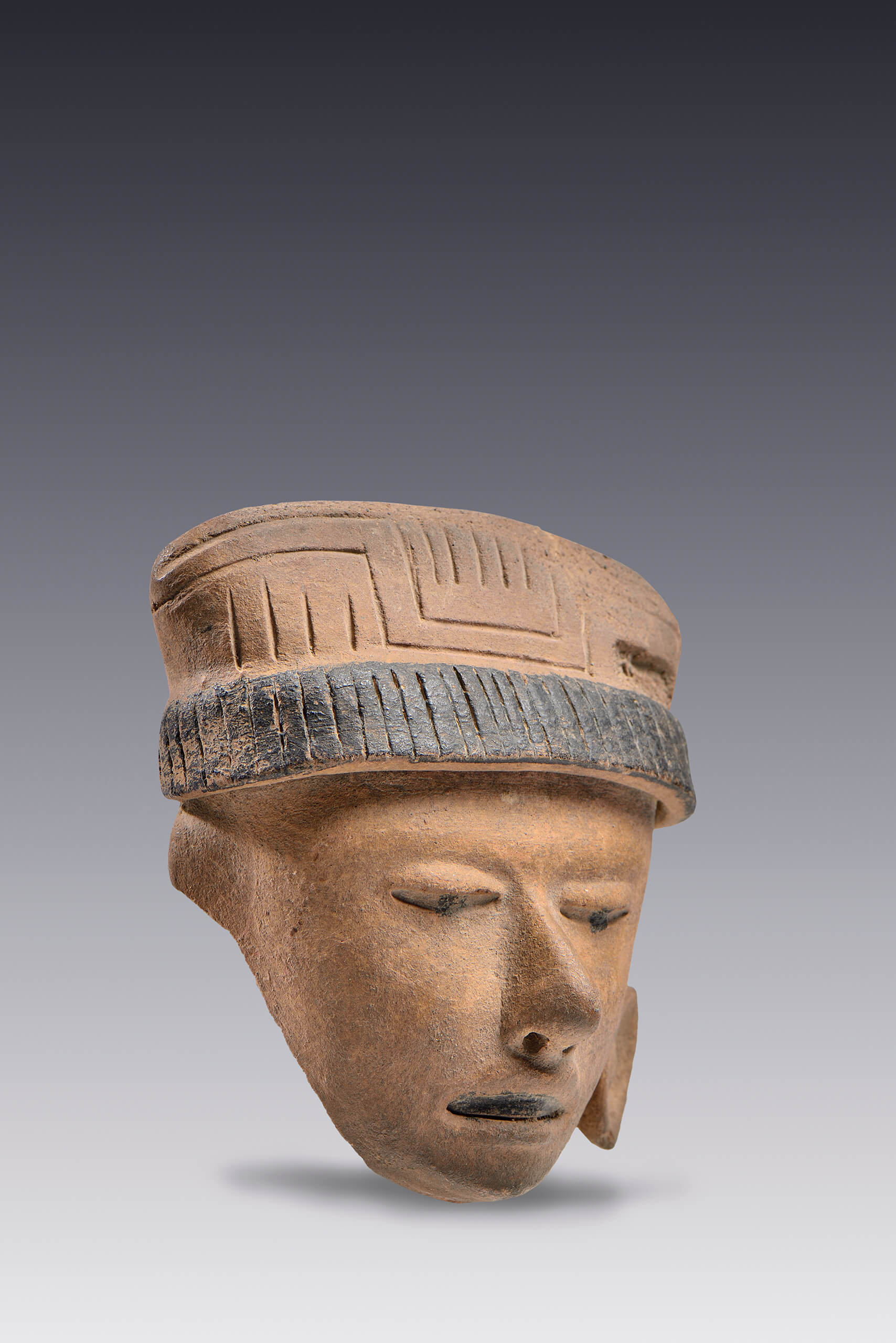 Rostros con decoración facial con chapopote | El tiempo en las cosas. Salas de Arte Contemporáneo | Museo Amparo, Puebla