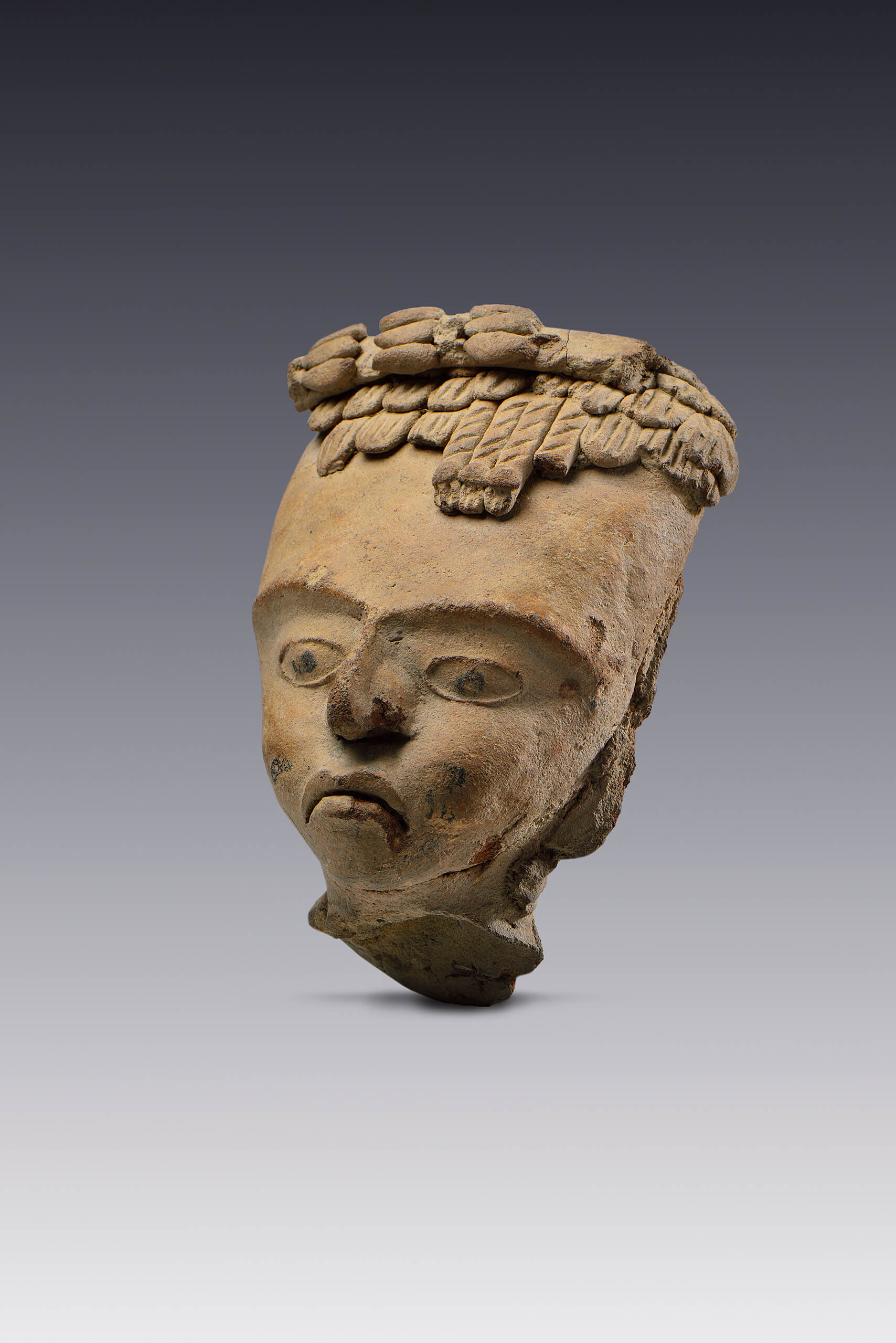 Rostros con decoración facial con chapopote | El México antiguo. Salas de Arte Prehispánico | Museo Amparo, Puebla