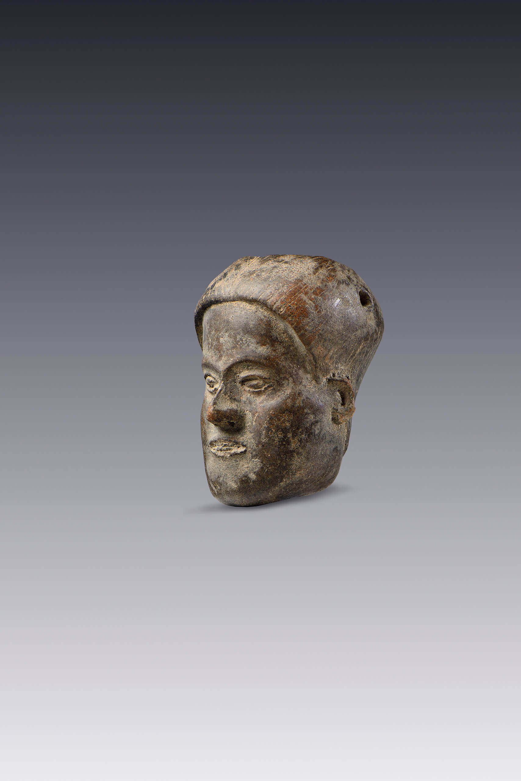 Vasija miniatura en forma de cabeza de personaje | El México antiguo. Salas de Arte Prehispánico | Museo Amparo, Puebla