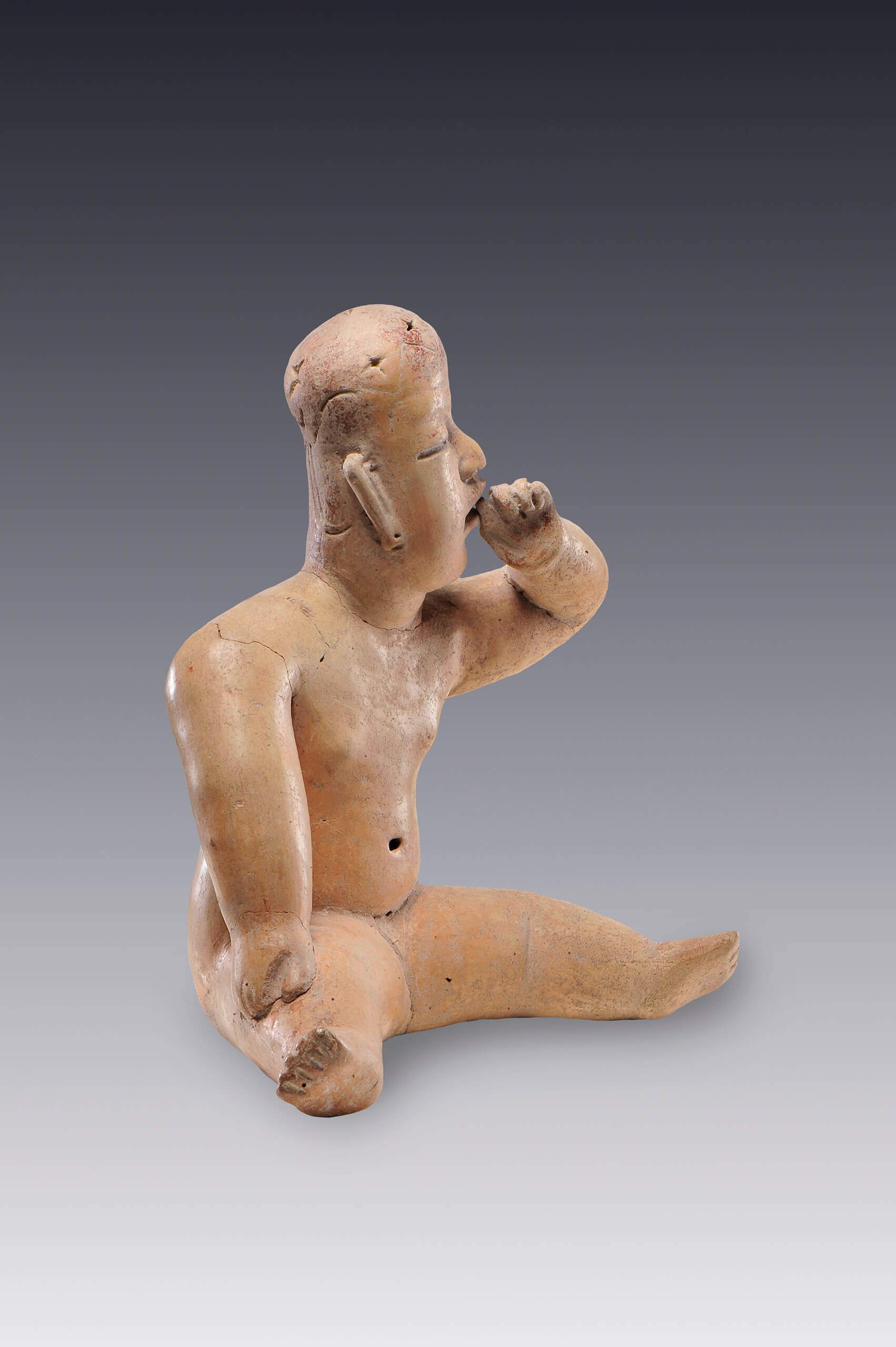 Hombre que se lleva la mano a la boca | El México antiguo. Salas de Arte Prehispánico | Museo Amparo, Puebla
