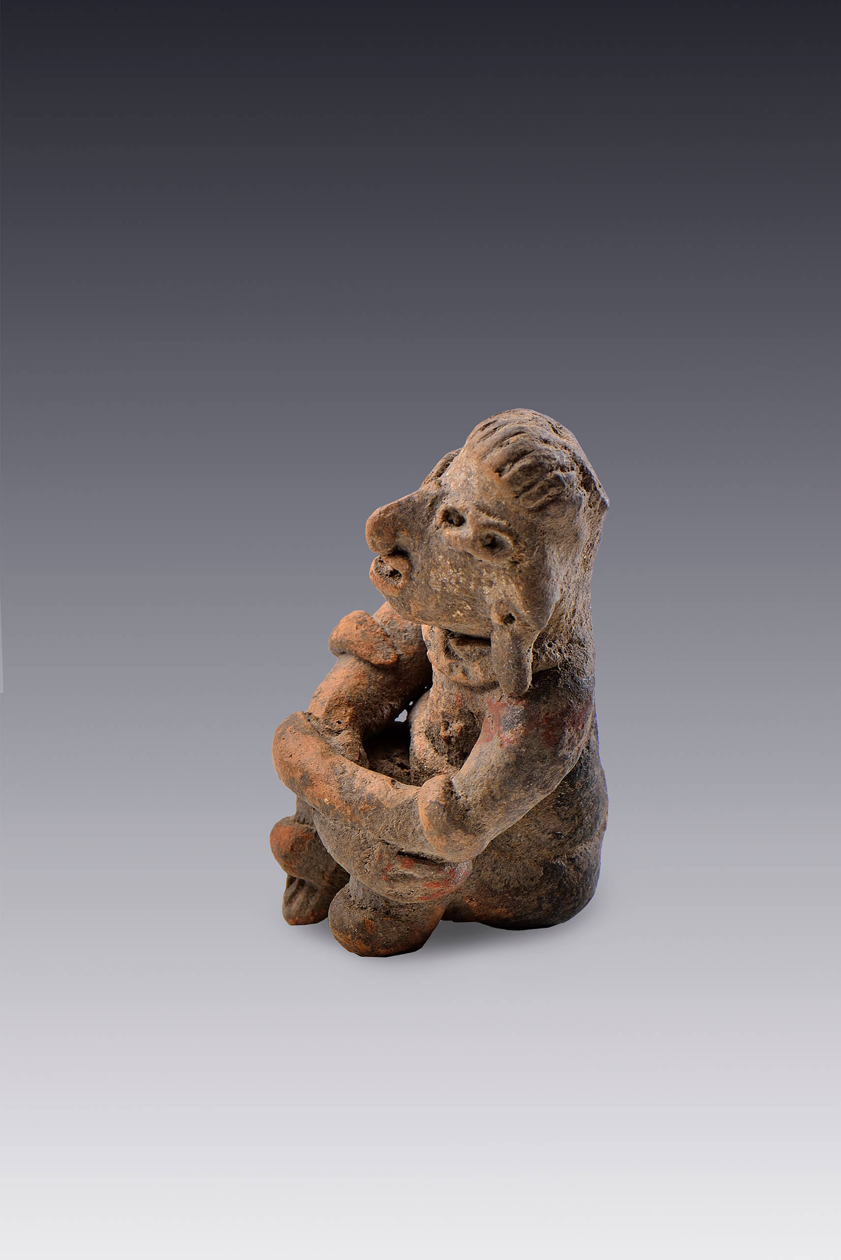 Figurilla antropomorfa sedente  | El México antiguo. Salas de Arte Prehispánico | Museo Amparo, Puebla