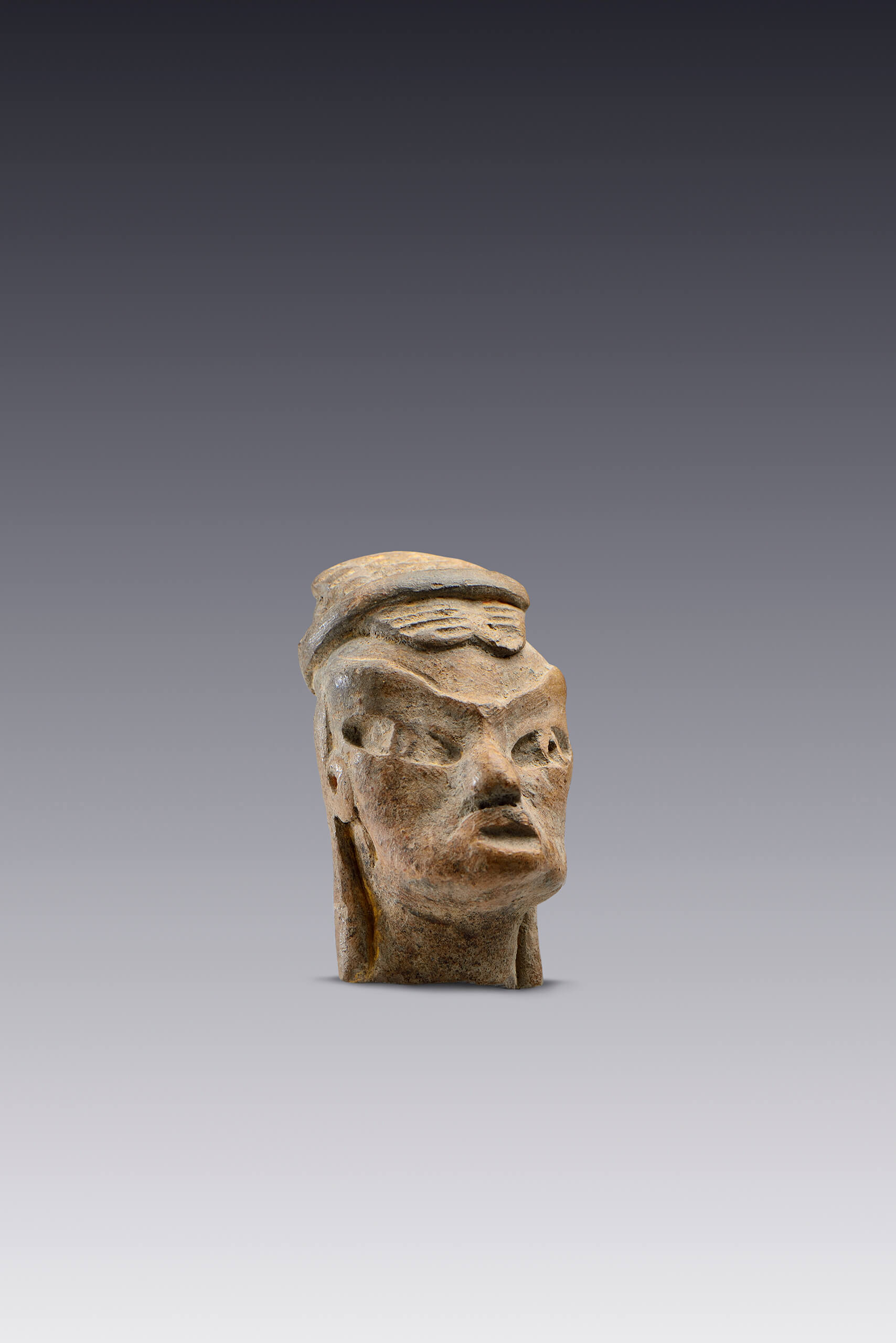 Cabezas de personajes con peinado | El México antiguo. Salas de Arte Prehispánico | Museo Amparo, Puebla