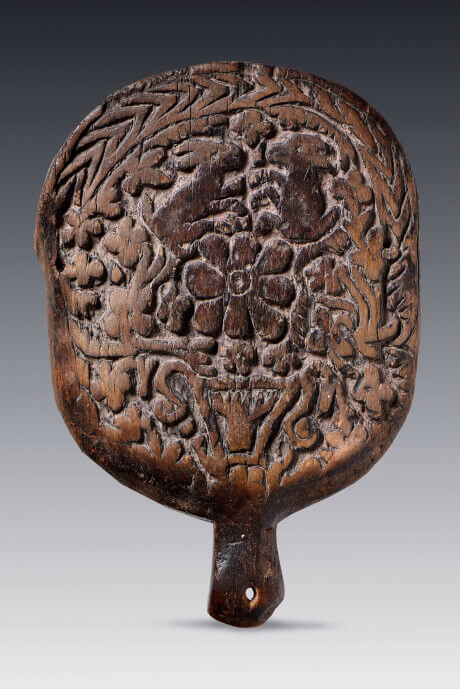 Sello de madera para tortillas con representación de liebres e iconografía otomí