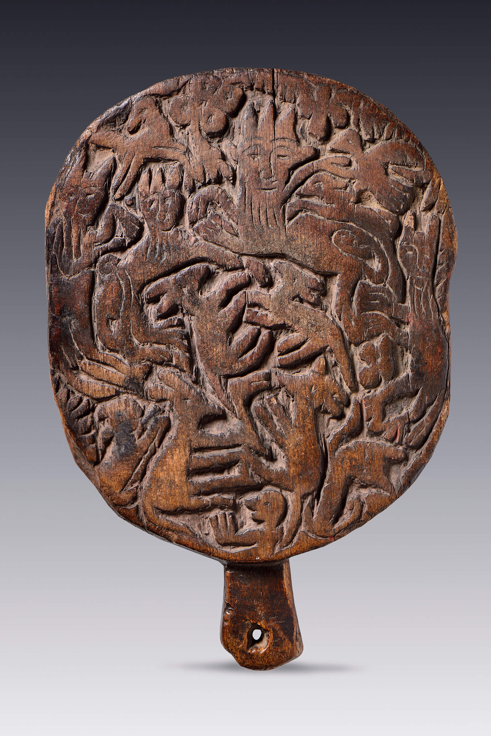Sello de madera para tortillas con representación de liebres e iconografía otomí | Salas de Arte Virreinal y Siglo XIX | Museo Amparo, Puebla