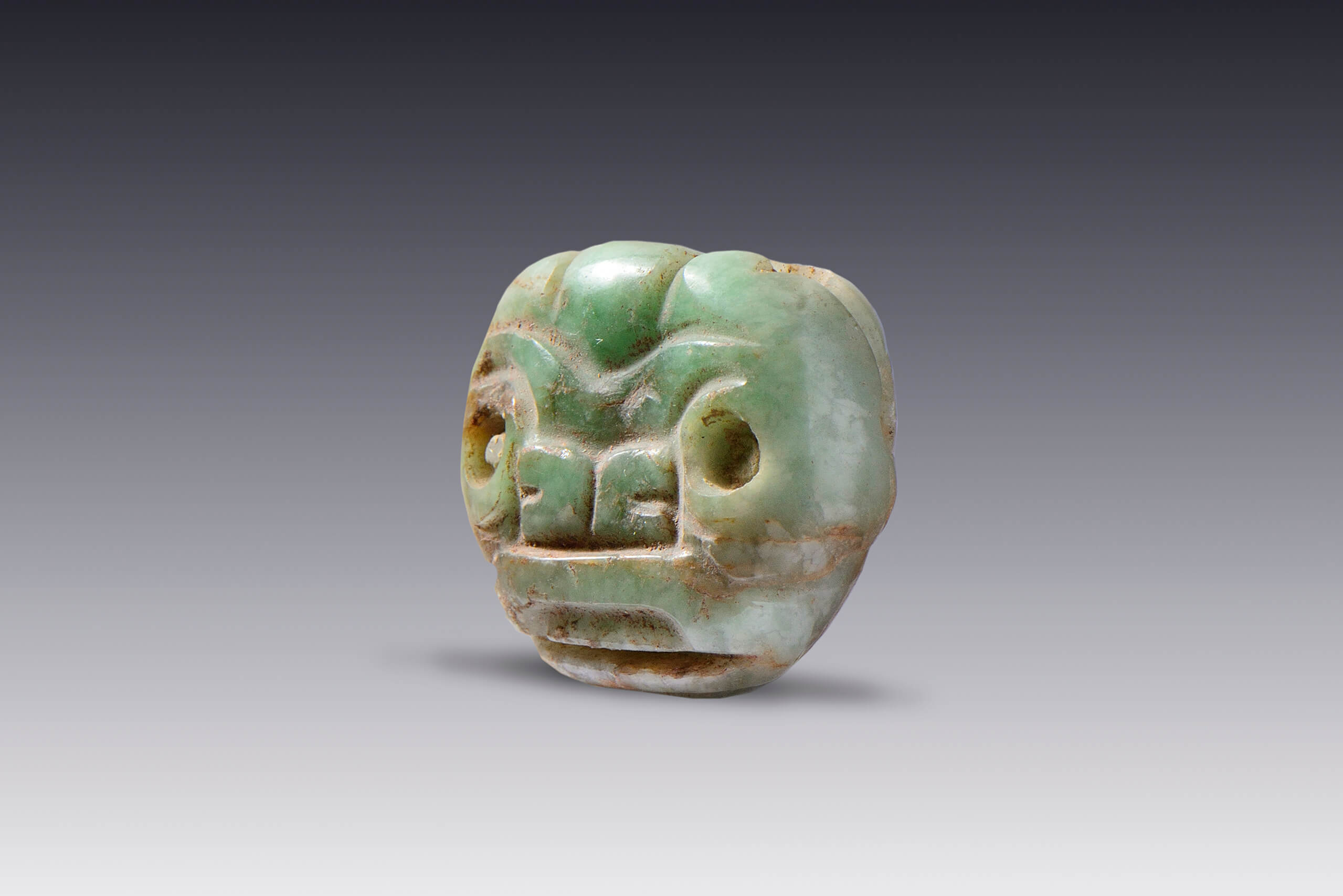 Pendientes de piedra verde con rasgos felinos | El México antiguo. Salas de Arte Prehispánico | Museo Amparo, Puebla