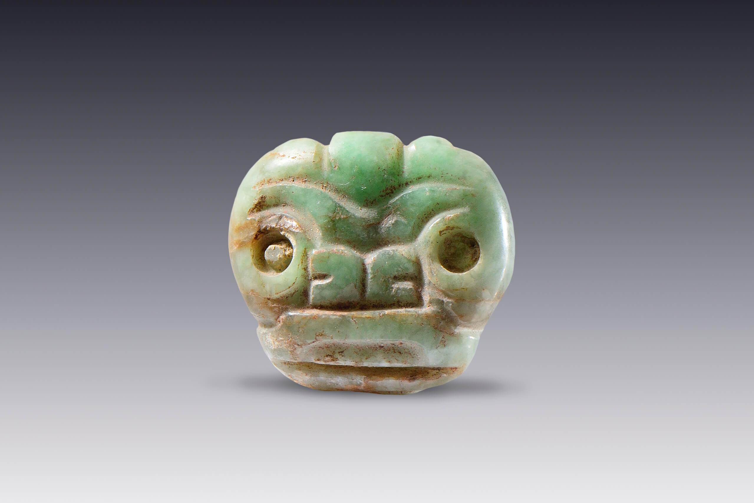 Pendientes de piedra verde con rasgos felinos | El México antiguo. Salas de Arte Prehispánico | Museo Amparo, Puebla