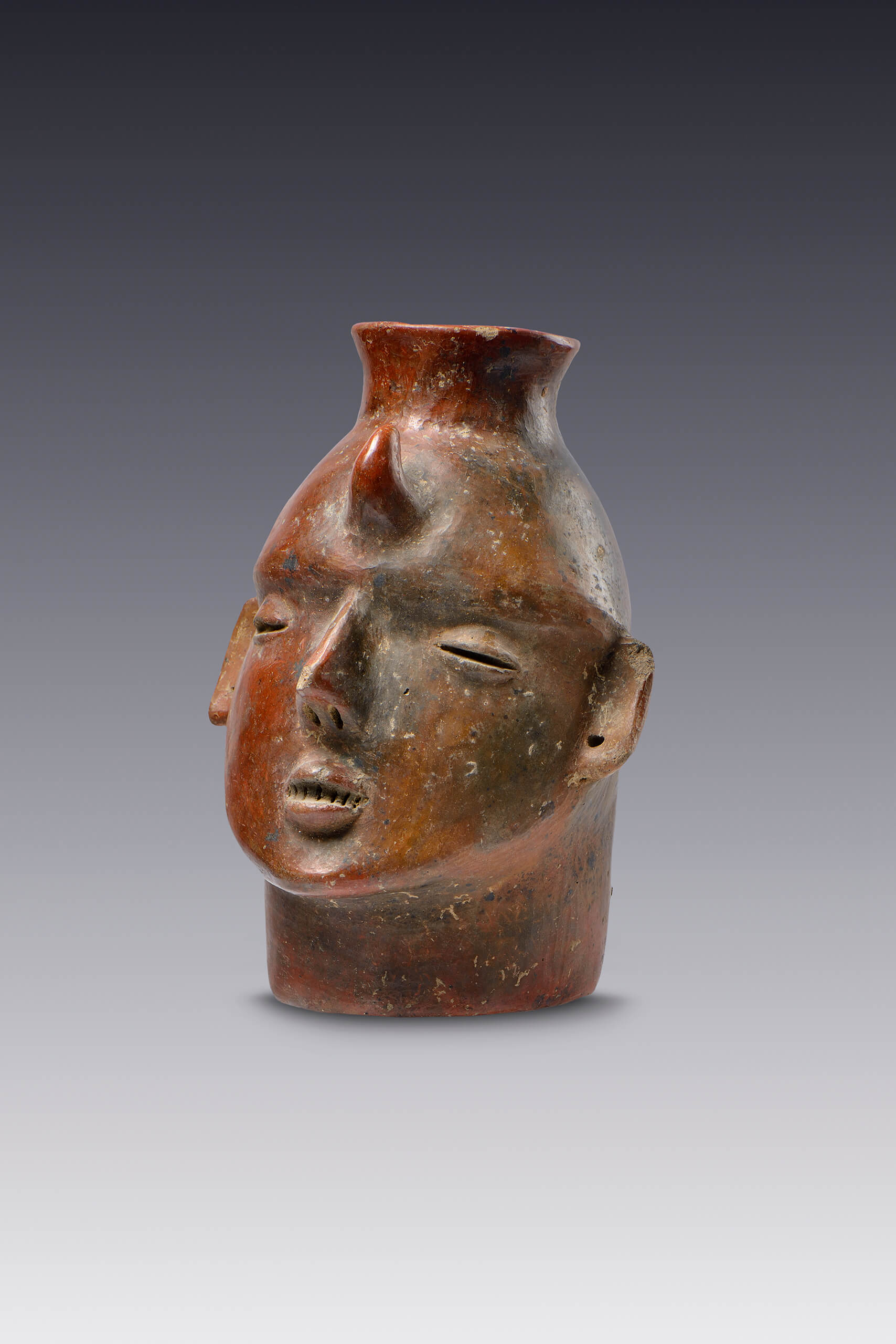 Cabeza humana corniforme | El México antiguo. Salas de Arte Prehispánico | Museo Amparo, Puebla