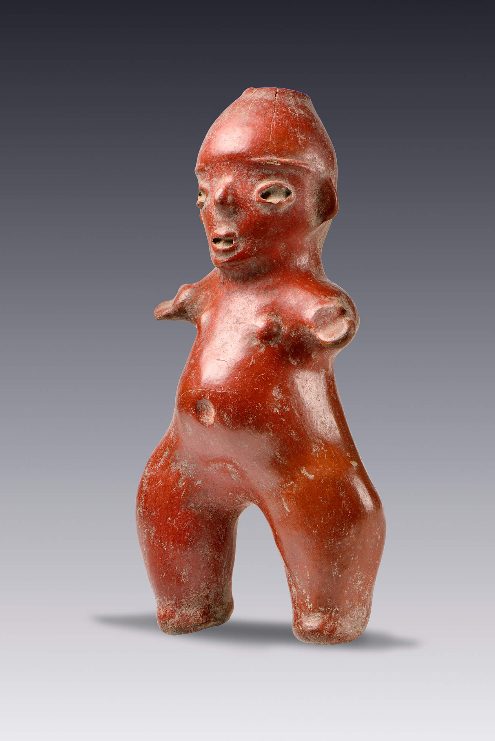 Figurilla femenina con engobe rojo  | El México antiguo. Salas de Arte Prehispánico | Museo Amparo, Puebla