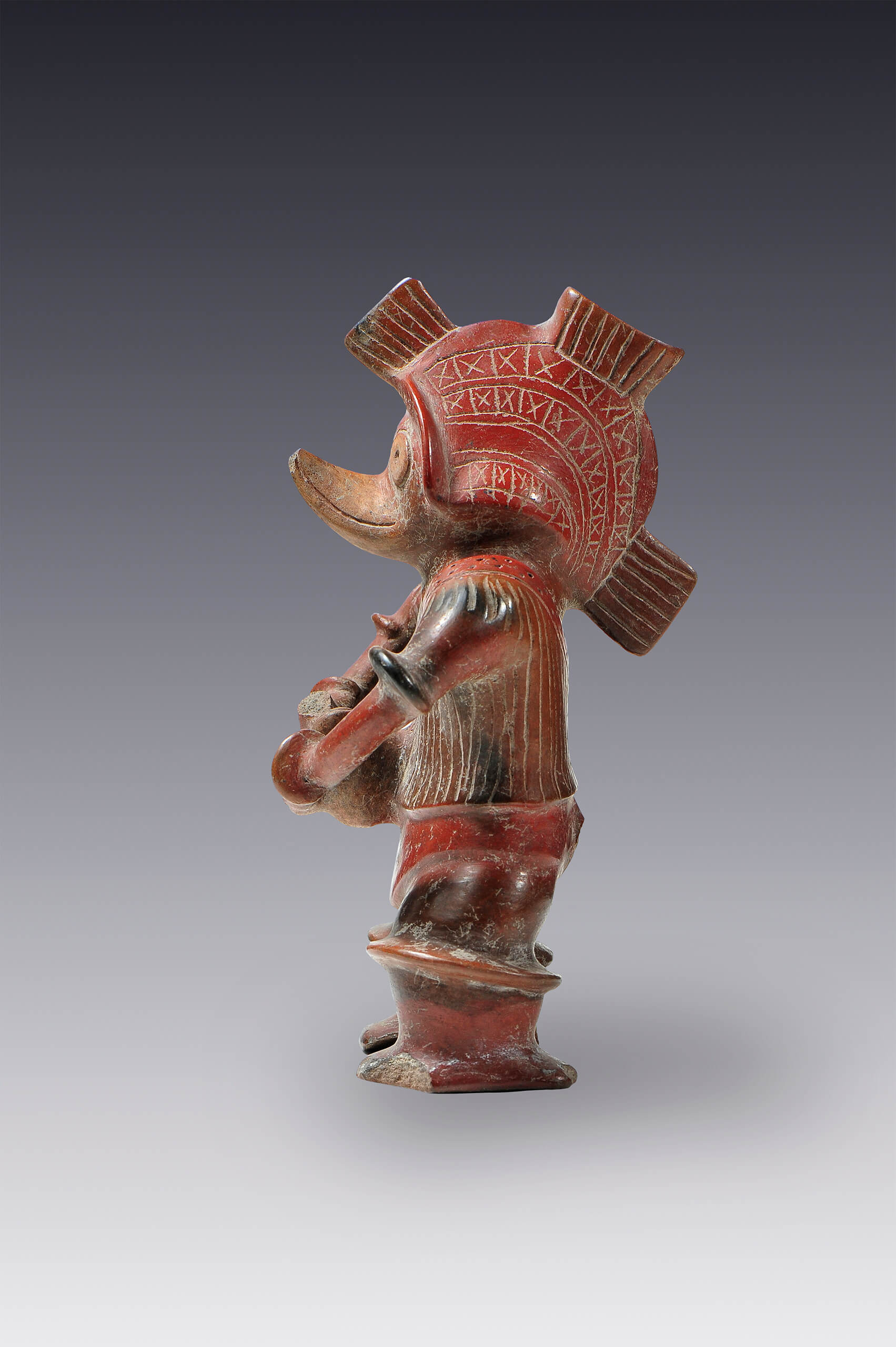 Músico con máscara de pato en un ritual propiciatorio de lluvia | El México antiguo. Salas de Arte Prehispánico | Museo Amparo, Puebla