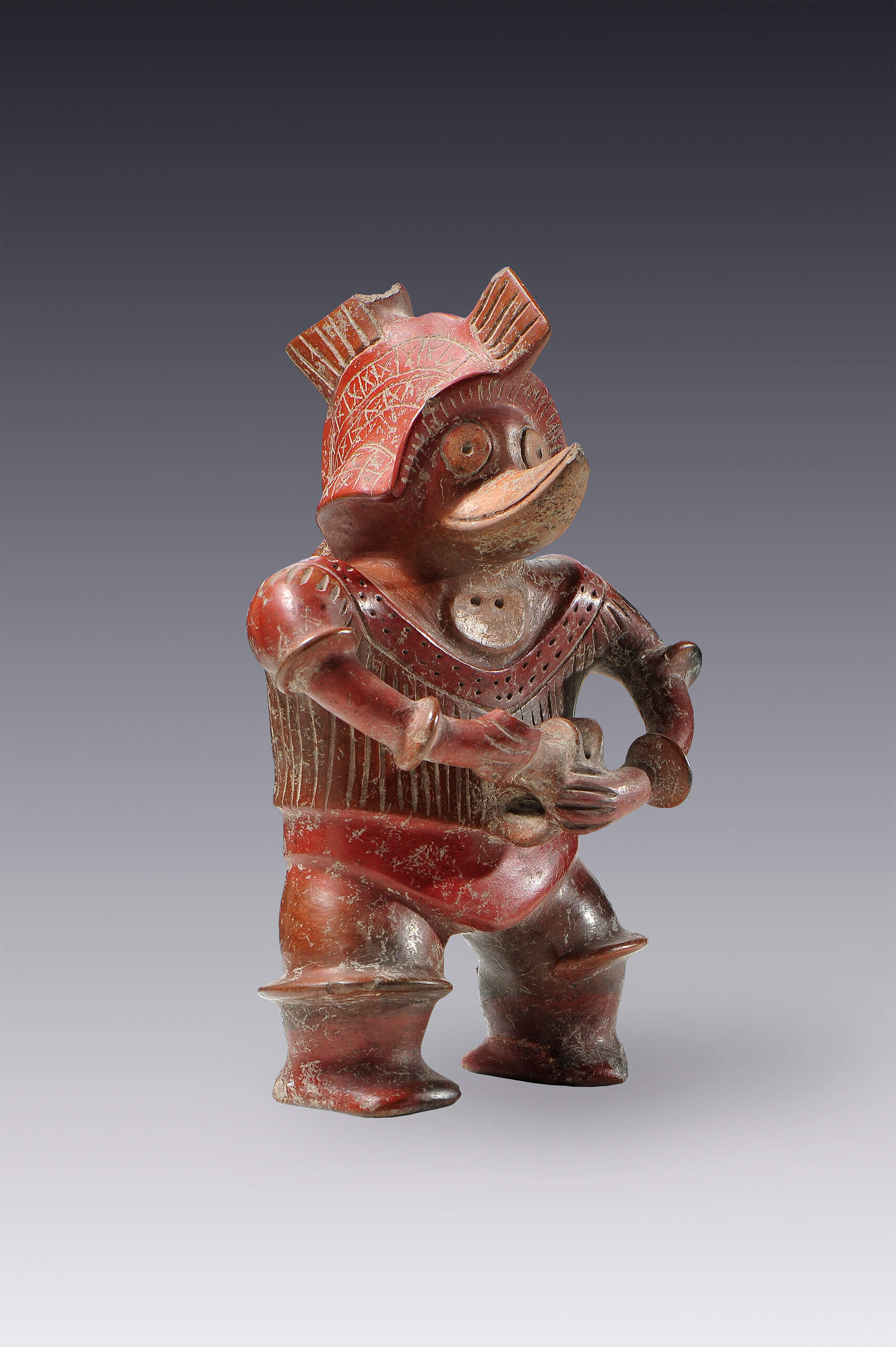 Músico con máscara de pato en un ritual propiciatorio de lluvia | El México antiguo. Salas de Arte Prehispánico | Museo Amparo, Puebla