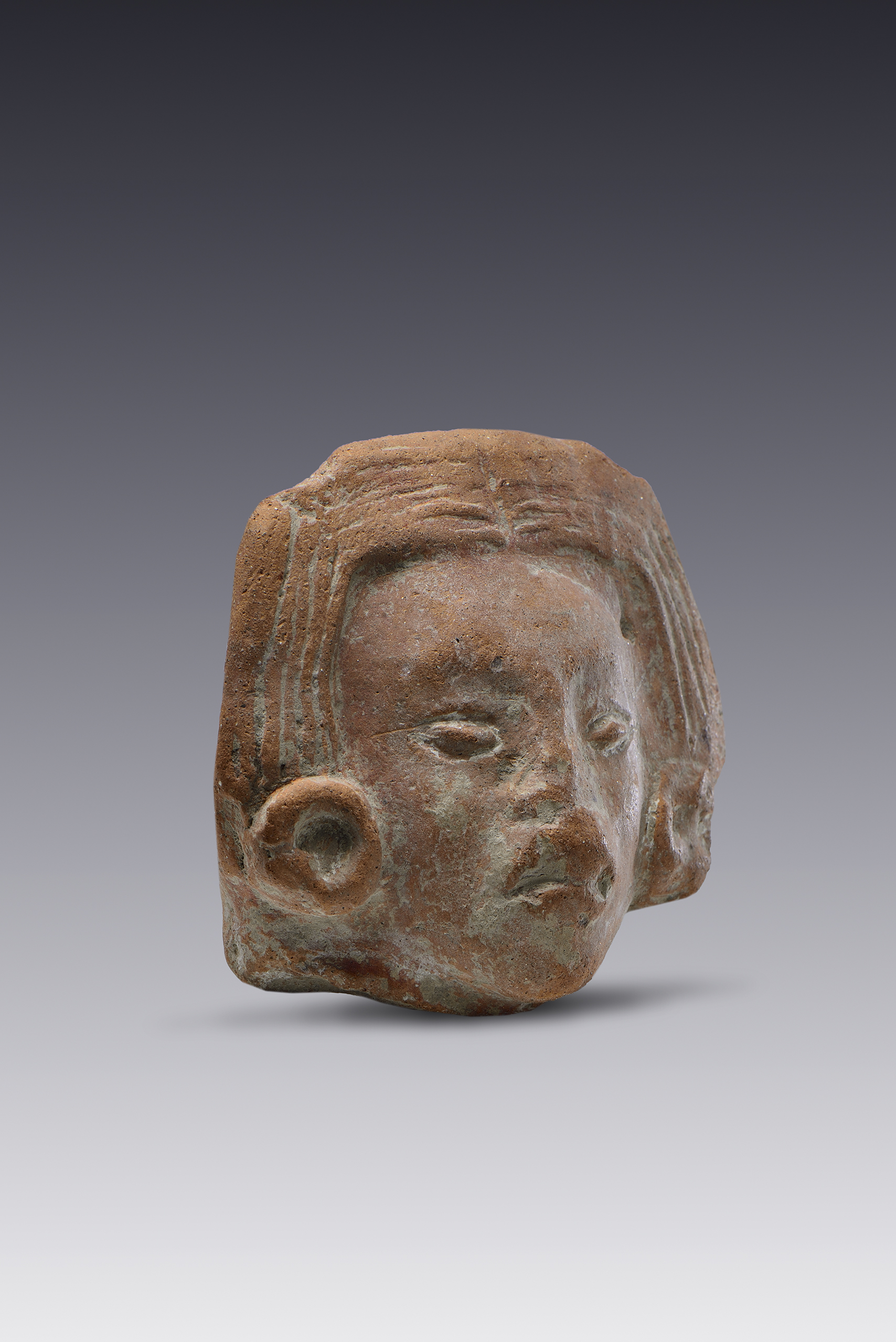 Cabeza de figurilla con ojos incisos | El México antiguo. Salas de Arte Prehispánico | Museo Amparo, Puebla