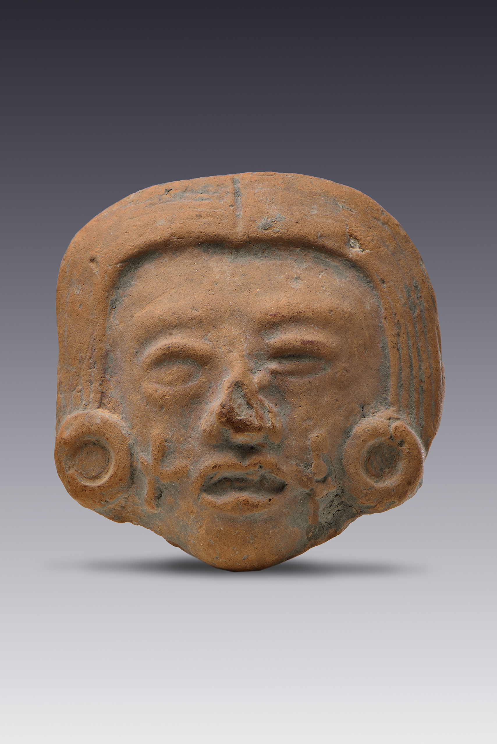 Cabeza de figurilla de mujer de élite | El México antiguo. Salas de Arte Prehispánico | Museo Amparo, Puebla