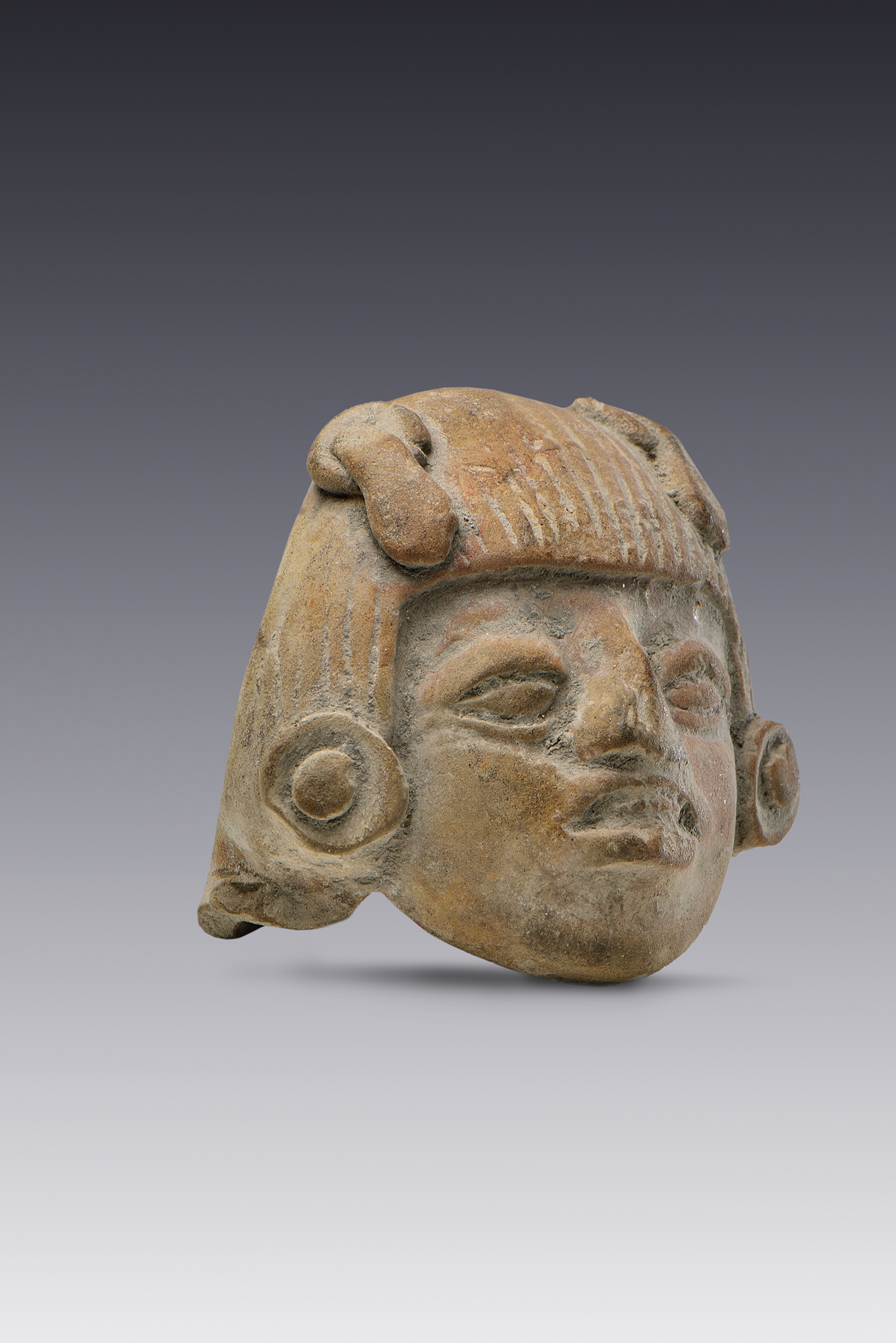 Cabezas con tocado de “moño”  | El México antiguo. Salas de Arte Prehispánico | Museo Amparo, Puebla