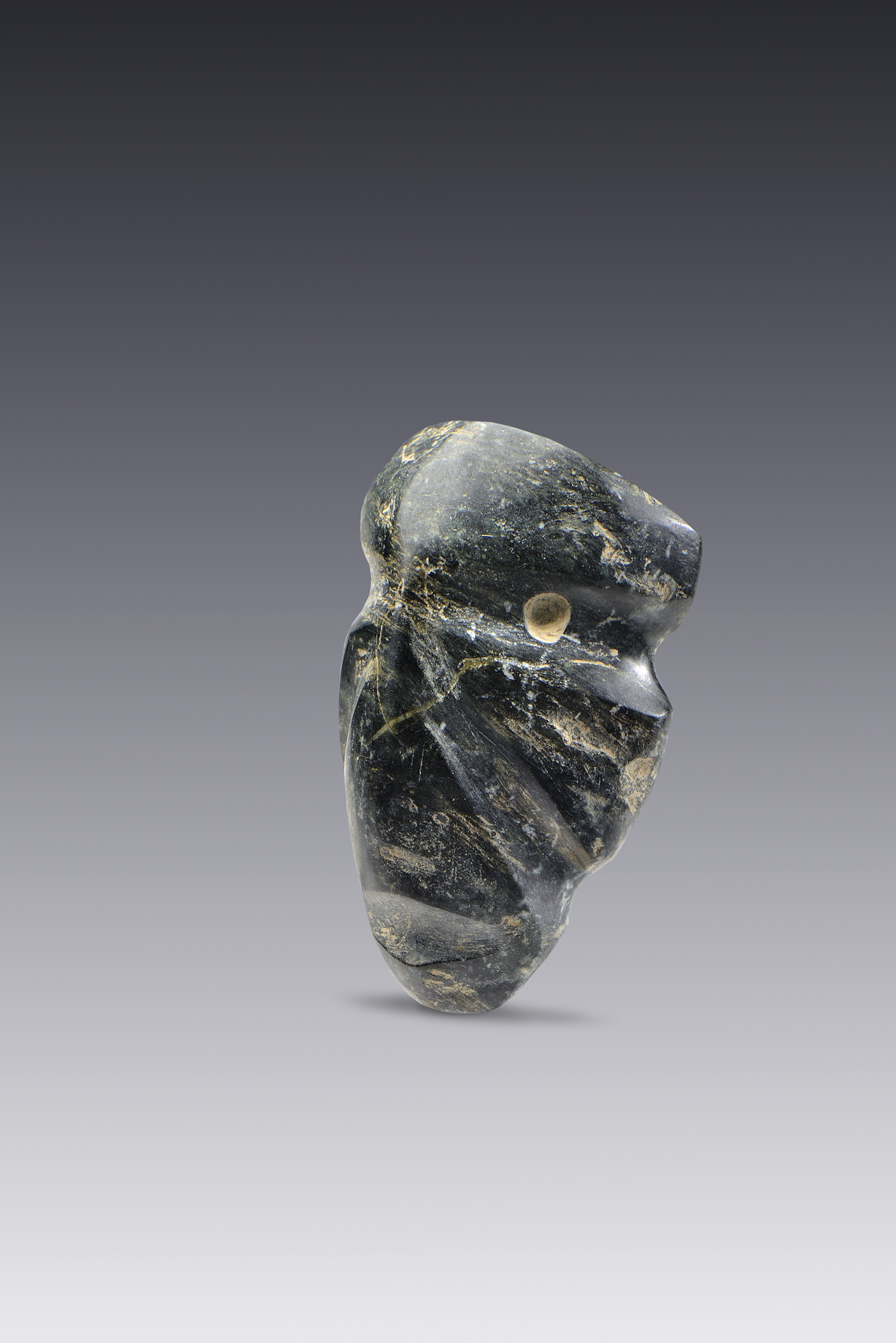 Pendiente Mezcala de máscara antropomorfa | El México antiguo. Salas de Arte Prehispánico | Museo Amparo, Puebla
