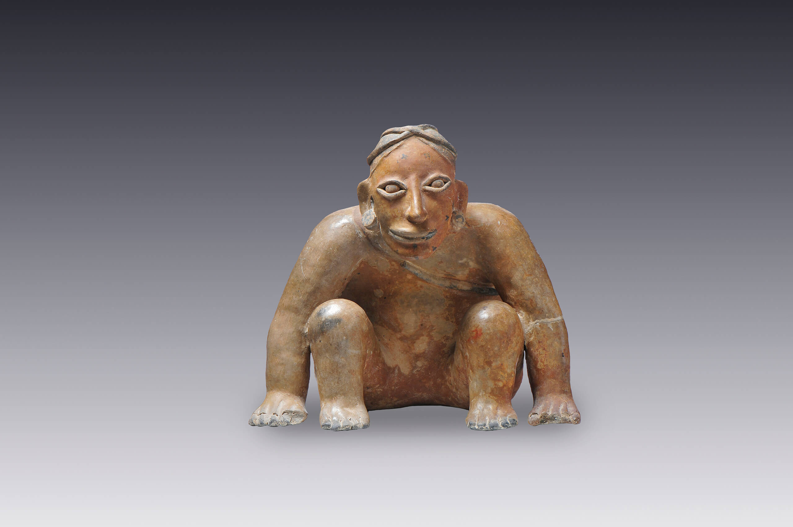 Hombre en cuclillas | El México antiguo. Salas de Arte Prehispánico | Museo Amparo, Puebla