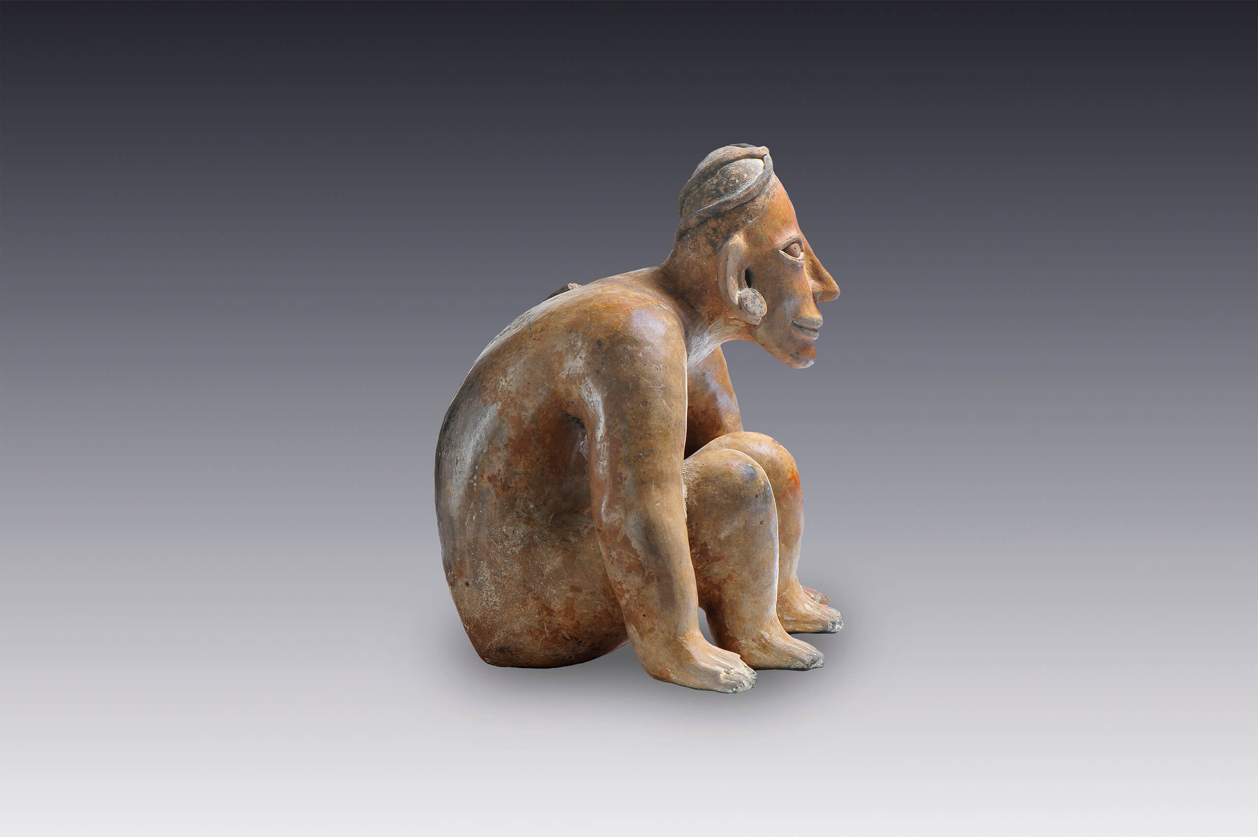 Hombre en cuclillas | El México antiguo. Salas de Arte Prehispánico | Museo Amparo, Puebla