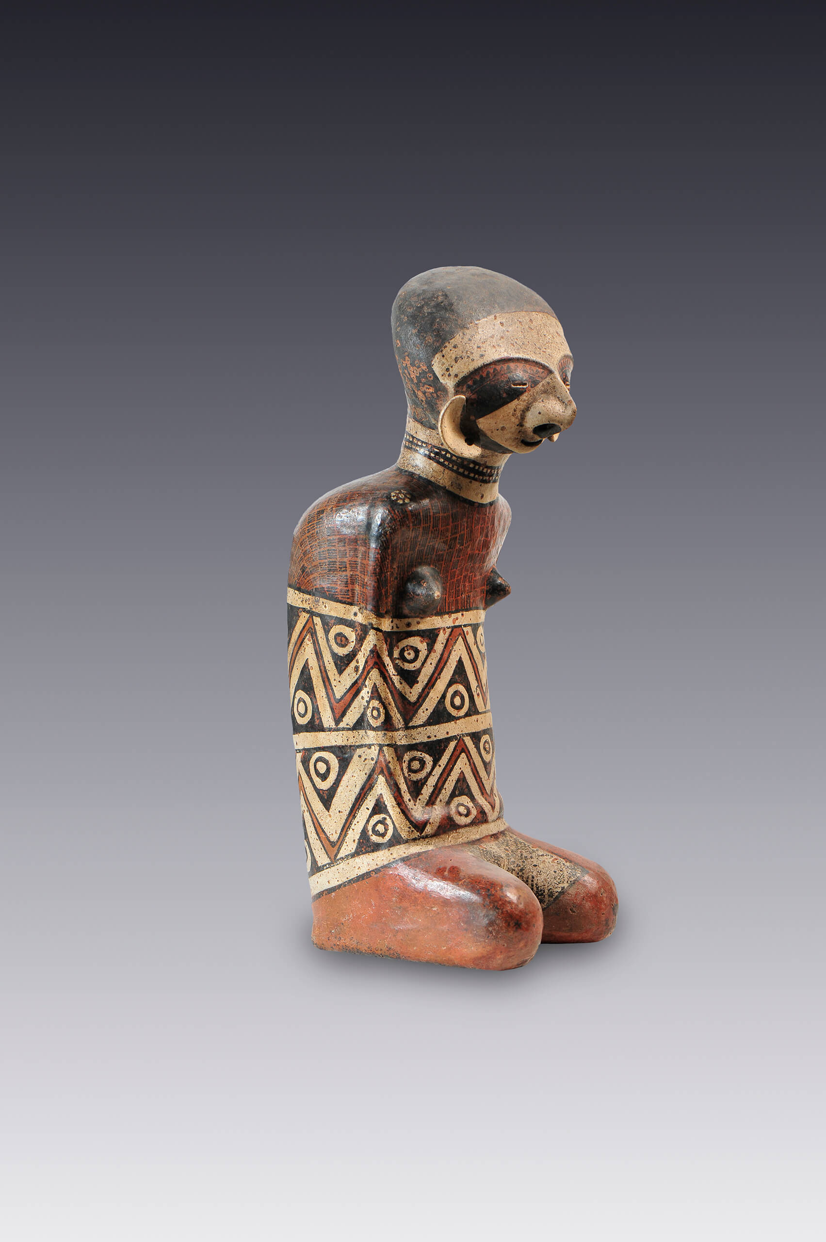 Mujer con decoración corporal geométrica | El México antiguo. Salas de Arte Prehispánico | Museo Amparo, Puebla