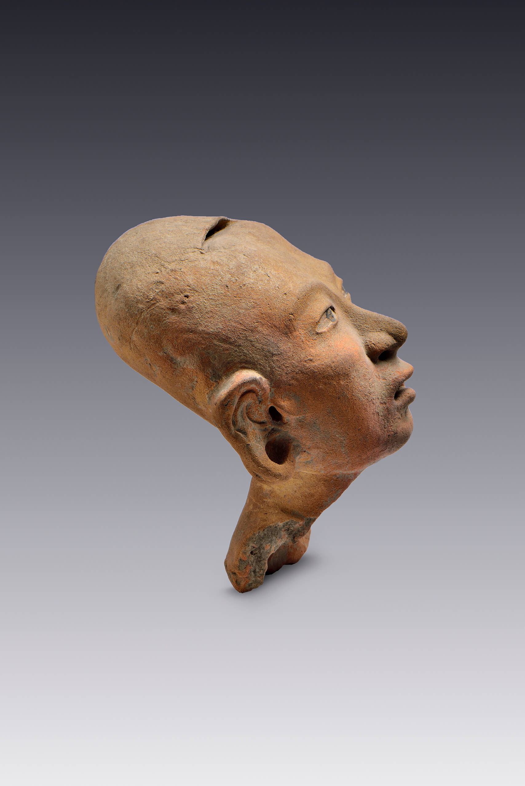 Rostro emitiendo una exhalaci&oacute;n | El M&eacute;xico antiguo. Salas de Arte Prehisp&aacute;nico | Museo Amparo, Puebla