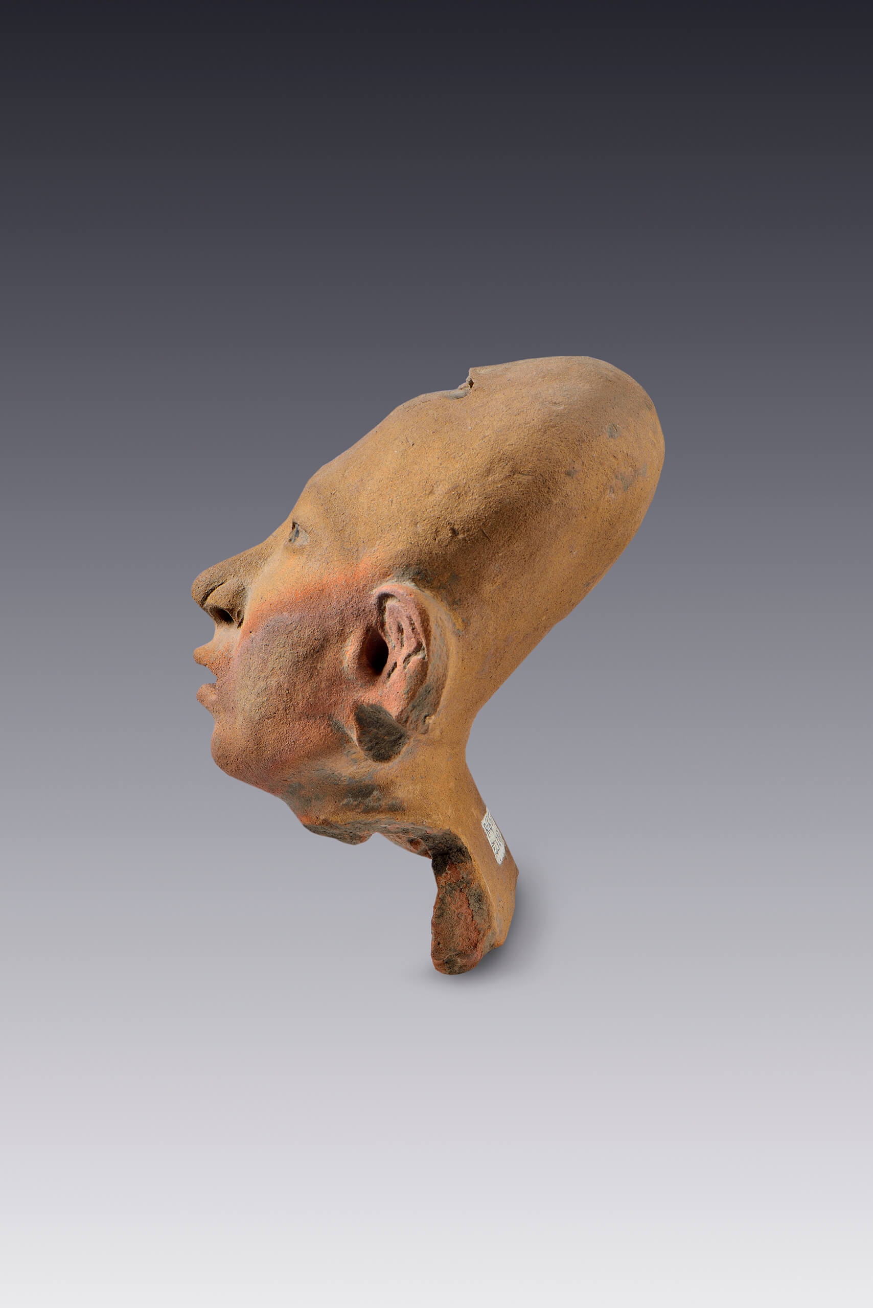 Rostro emitiendo una exhalaci&oacute;n | El M&eacute;xico antiguo. Salas de Arte Prehisp&aacute;nico | Museo Amparo, Puebla