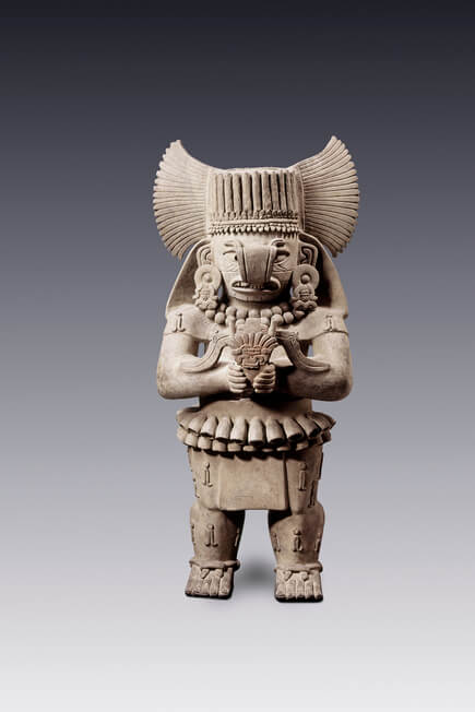 Escultura de barro de un dios zapoteco con elementos de lluvia