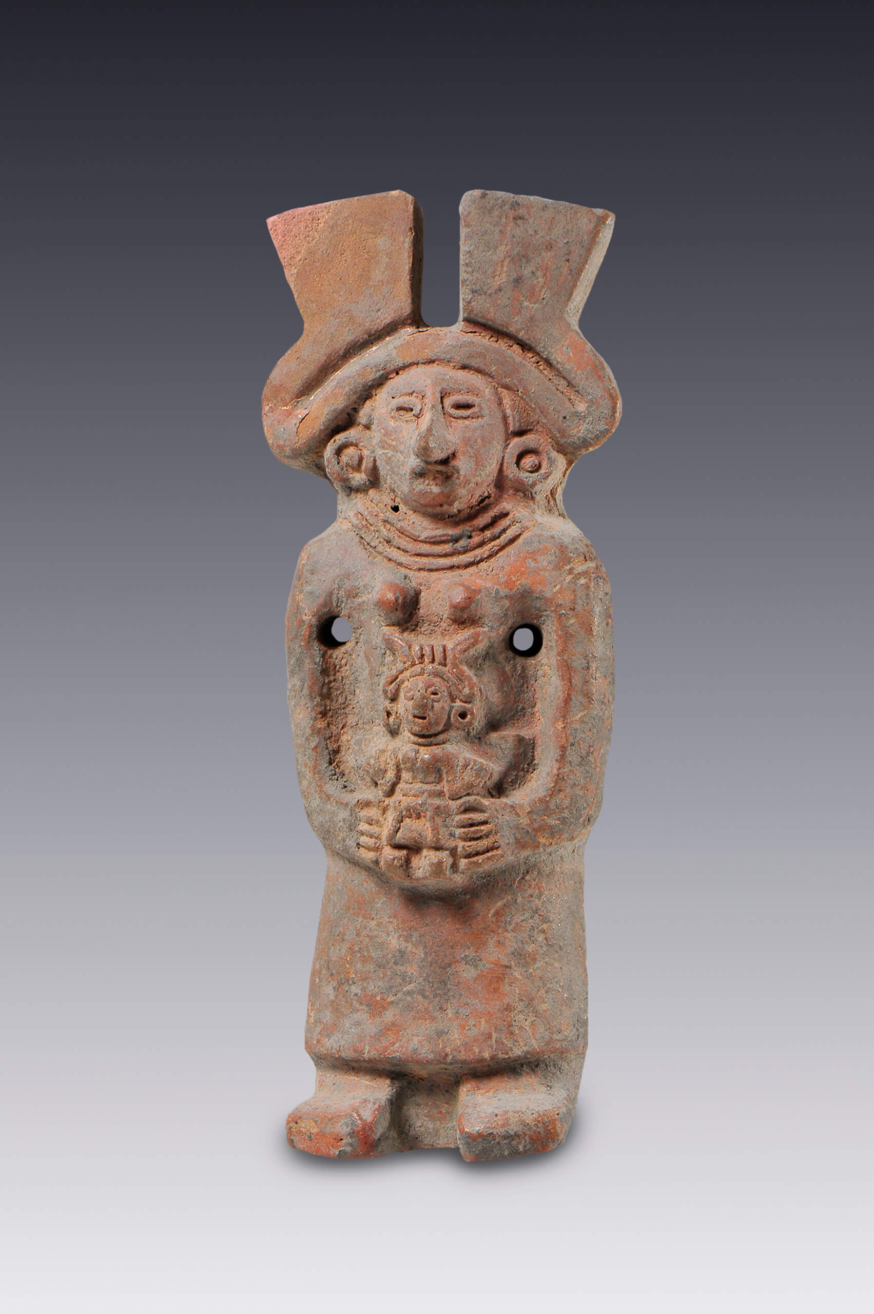 Figurilla de Xochiquetzal que carga a una criatura | El México antiguo. Salas de Arte Prehispánico | Museo Amparo, Puebla